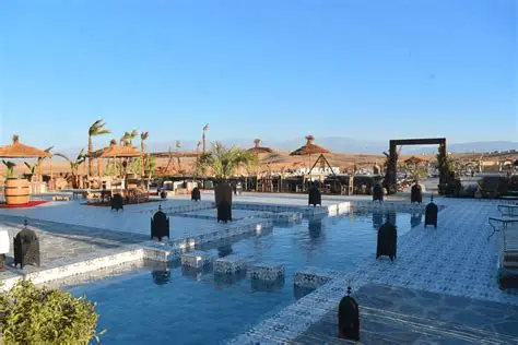 Infinity-edge desert pool at sunset