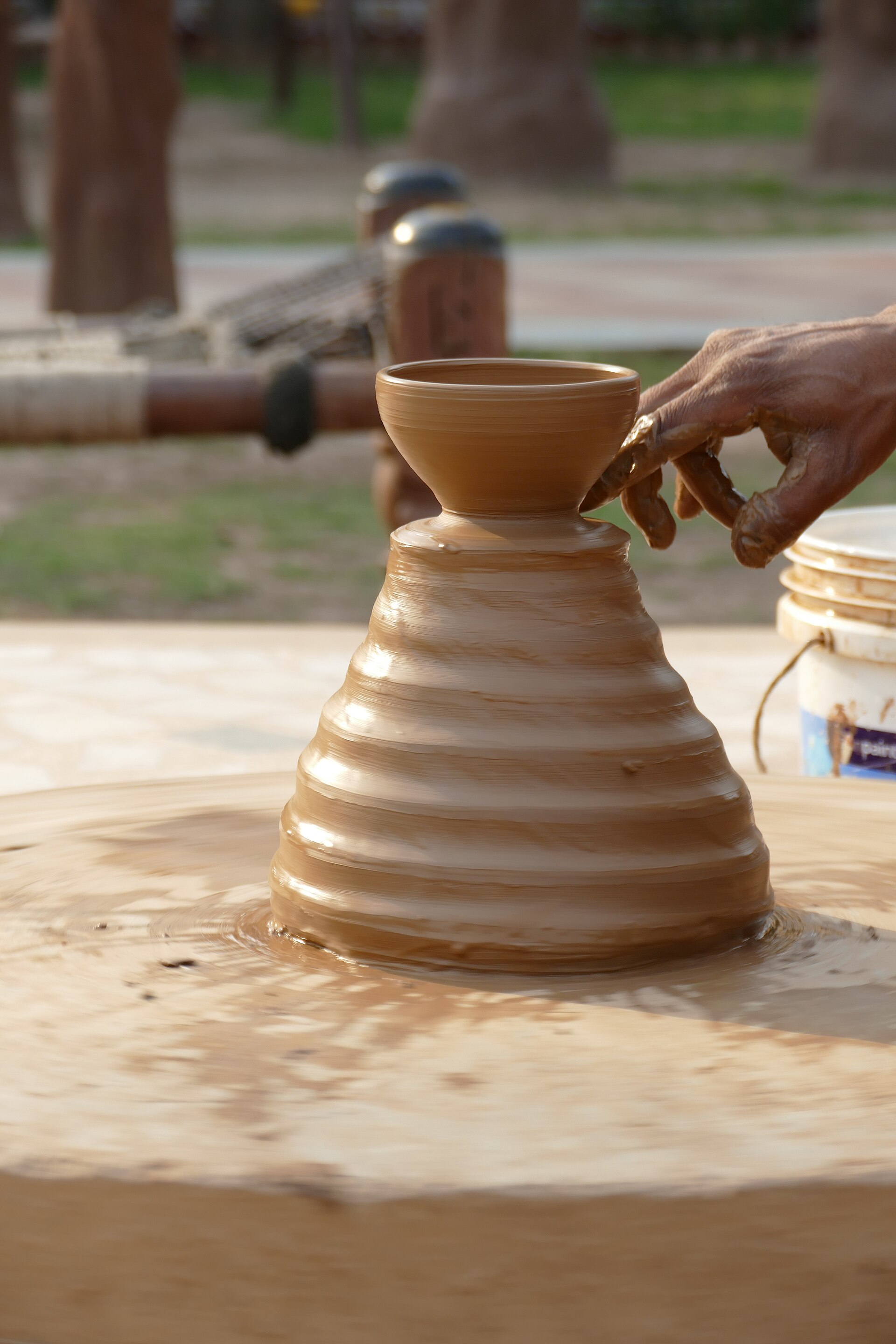 Finished pottery pieces on display at a traditional workshop